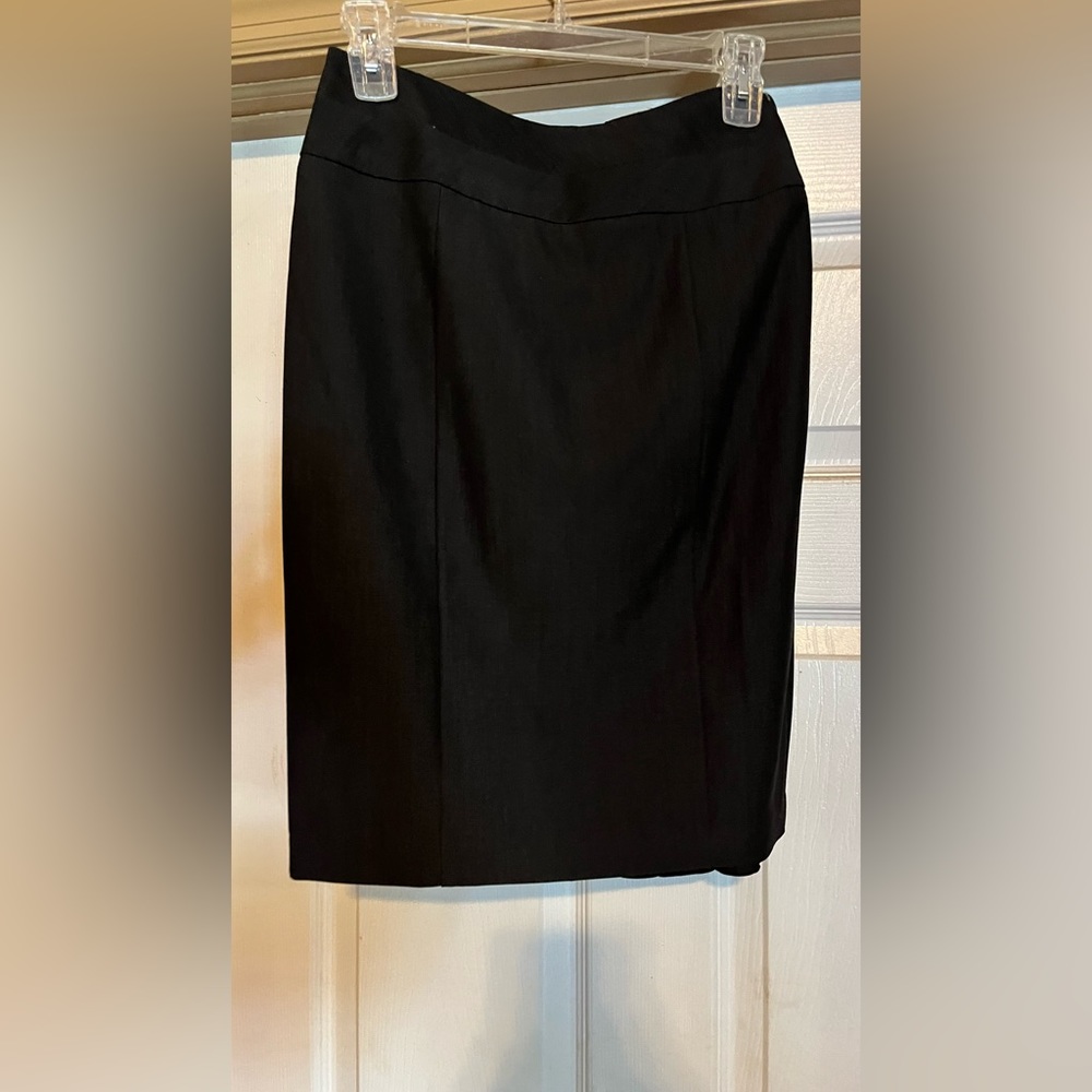 Skirt straight in front ruffle in back